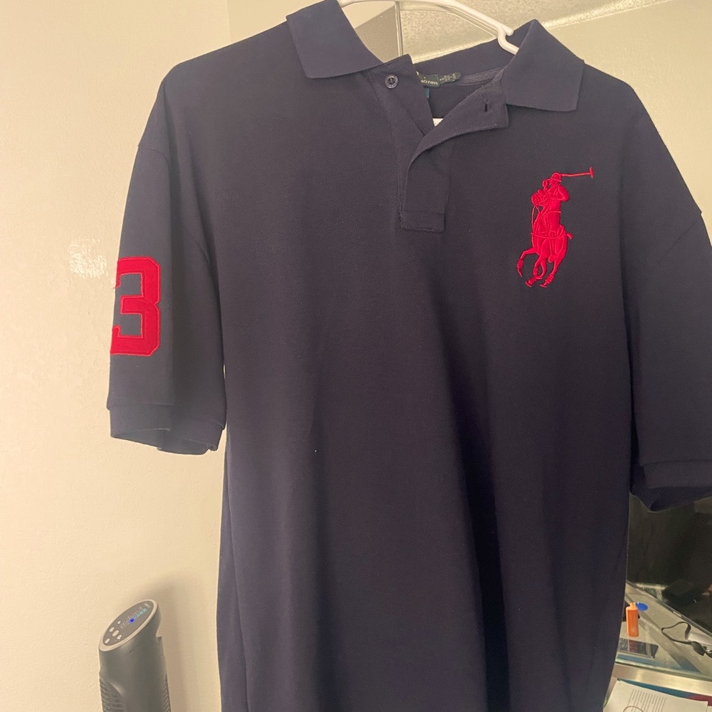 RALPH LAUREN BIG PONY ITS PRETTY MUCH BRAND NEW IF YOU REFER TO THE COLLAR?